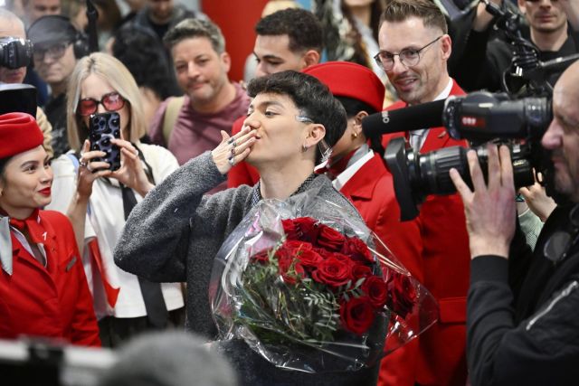 Photo: The Canadian Press JJ, center, from Austria arrives at the airport in Vienna, Austria, Sunday, May 18, 2025, after winning the Grand Final of the 69th Eurovision Song Contest, in Basel yesterday.