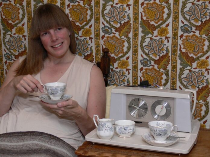 Spain An attractive woman with some attractive wallpaper and an attractive teasmade.